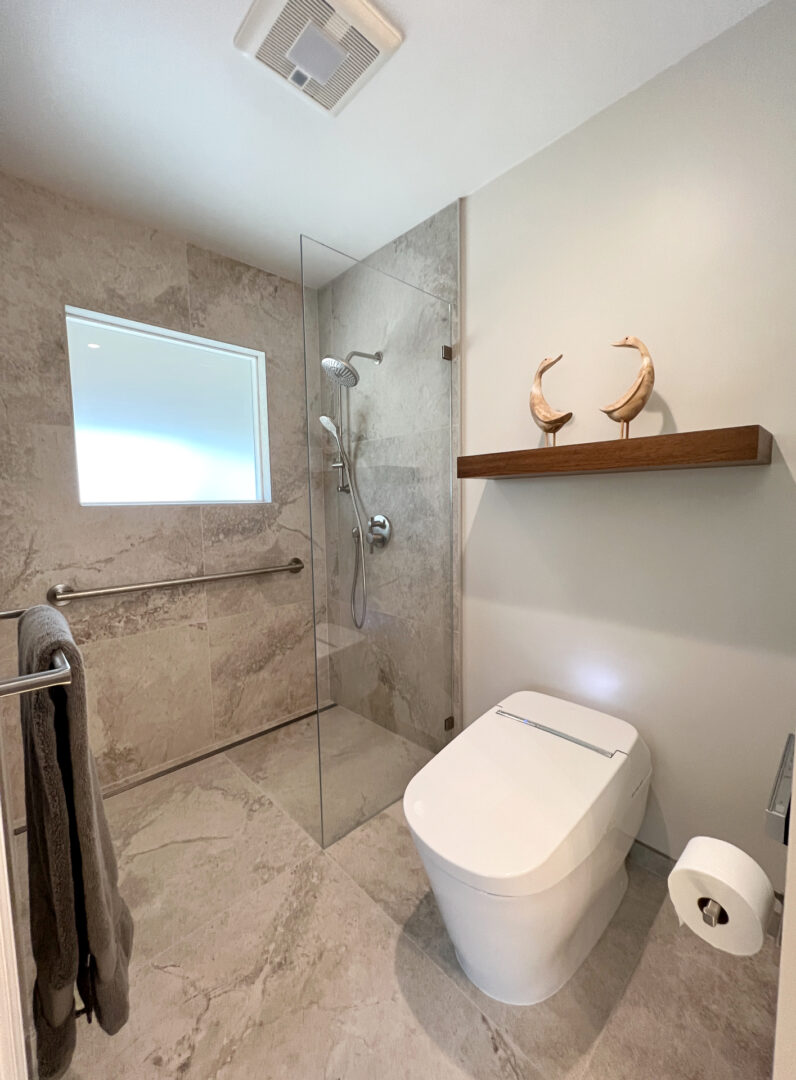 A Bathroom Space With a Glass Cabinet Shower