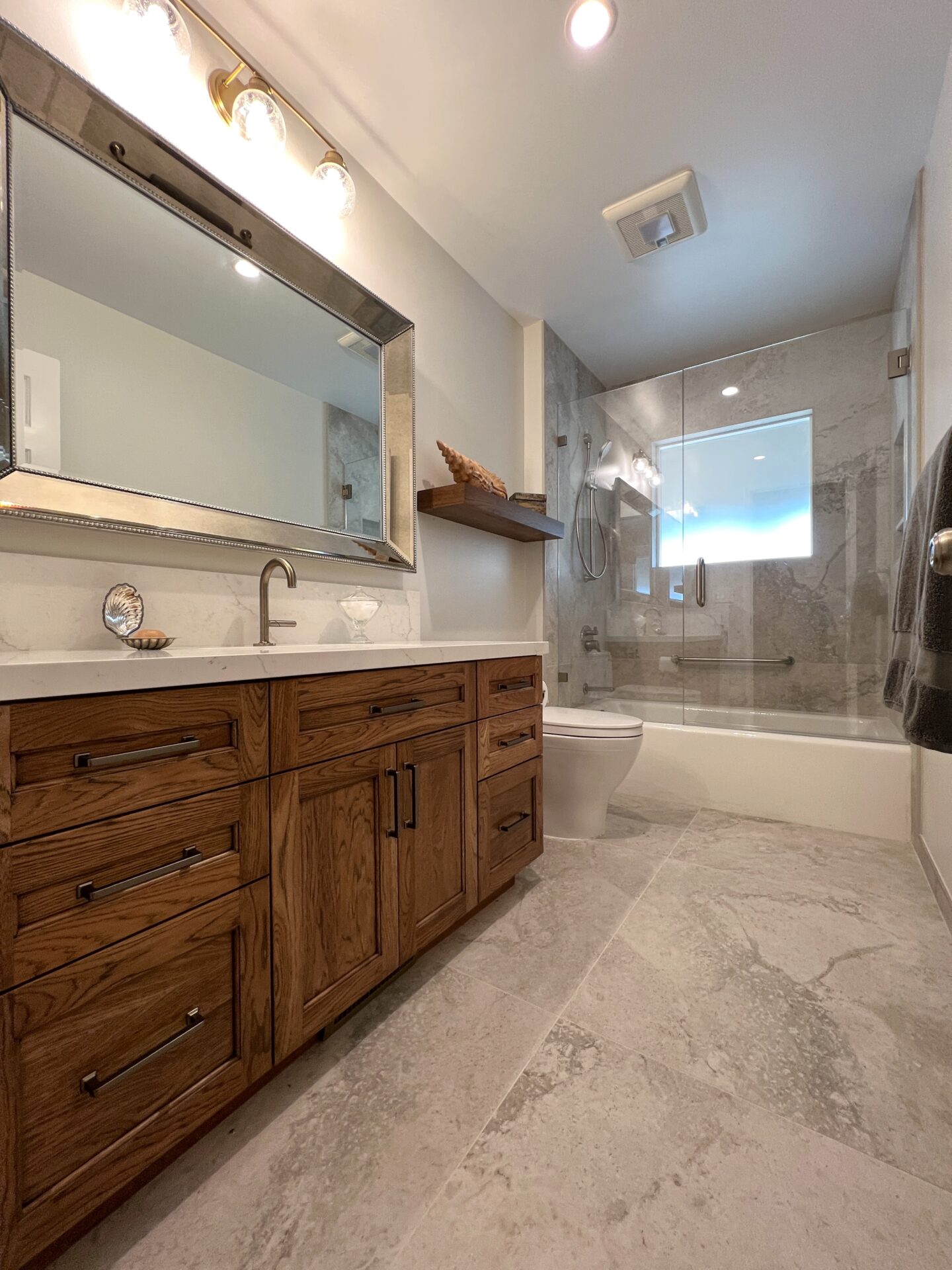 A Wood Cabinet Space With a Counter and a Sink